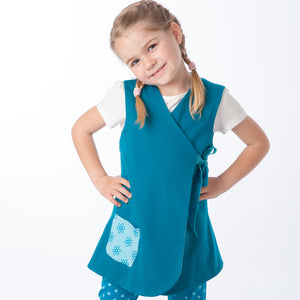 Lined baby tunic wrap dress pattern for girls. Easy sewing reversible dress with or without sleeves. Paper pattern MARIE by Patternforkids - Patternforkids